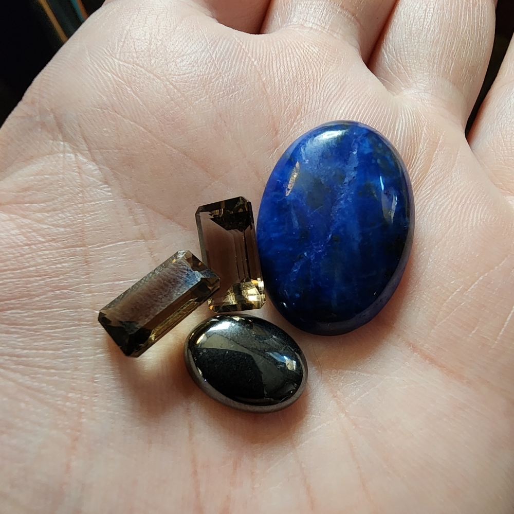 Smokey quartz, hematite and lapis lazuli stones